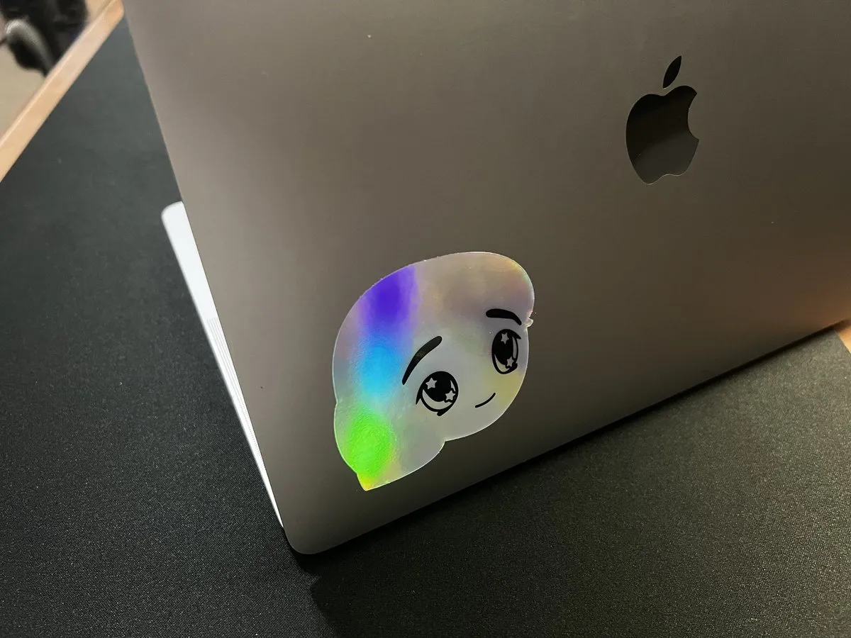 Mi777 sticker on laptop